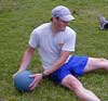 A medicine ball exersise that works on the Obliques and Abs